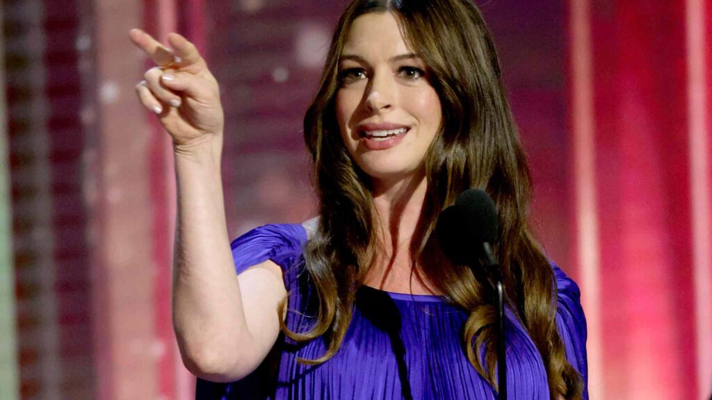 Pregnant Anne Hathaway Looks Regal in Purple Caped Gown at the 2026 Disney Legends Awards