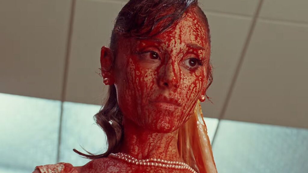 Ariana Grande Wields a Chainsaw at Critics While Taking on Her Complex Relationship with Fame in Bloody ‘Petal’ Video