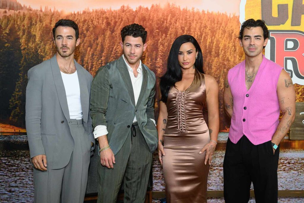 Demi Lovato Reunites with Jonas Brothers at L.A. Premiere of “Camp Rock 3”