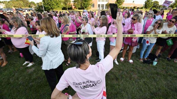 Hundreds of Lindsay Clancy Supporters, Many Wearing Pink, Rally Outside Courthouse During Murder Trial