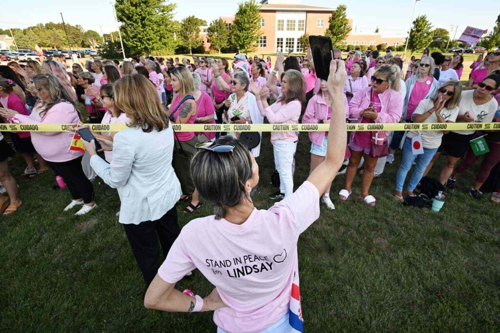 Hundreds of Lindsay Clancy Supporters, Many Wearing Pink, Rally Outside Courthouse During Murder Trial