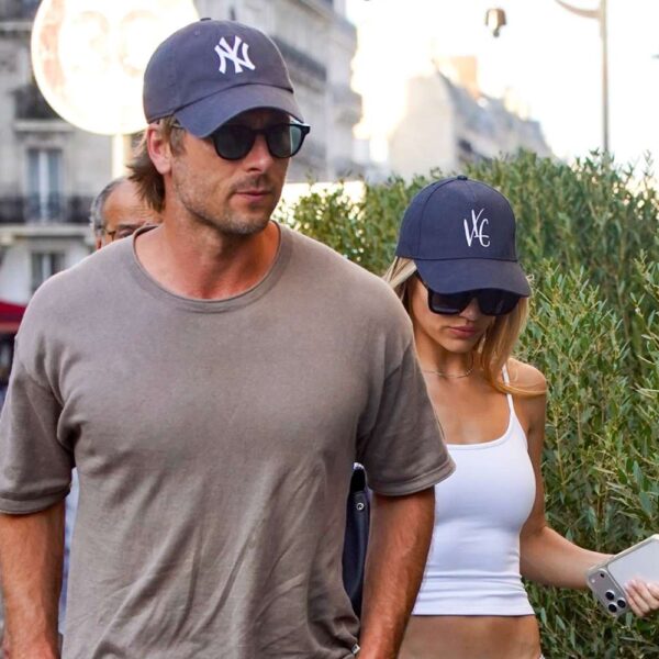 Glen Powell and Girlfriend Michelle Randolph Share a Steamy Kiss in Paris