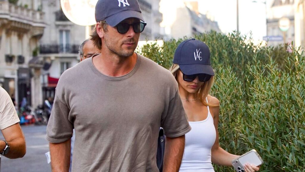 Glen Powell and Girlfriend Michelle Randolph Share a Steamy Kiss in Paris