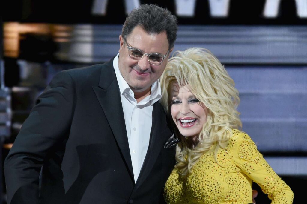 Vince Gill Says He’s ‘Crushed’ Over Death of Friend and Collaborator Dolly Parton