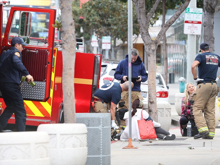 oppenheimer group barricades fall on woman