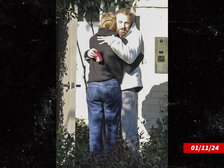 Ben Affleck hugs Violet Affleck after returning home as fires rage near Pacific Palisades bg 3