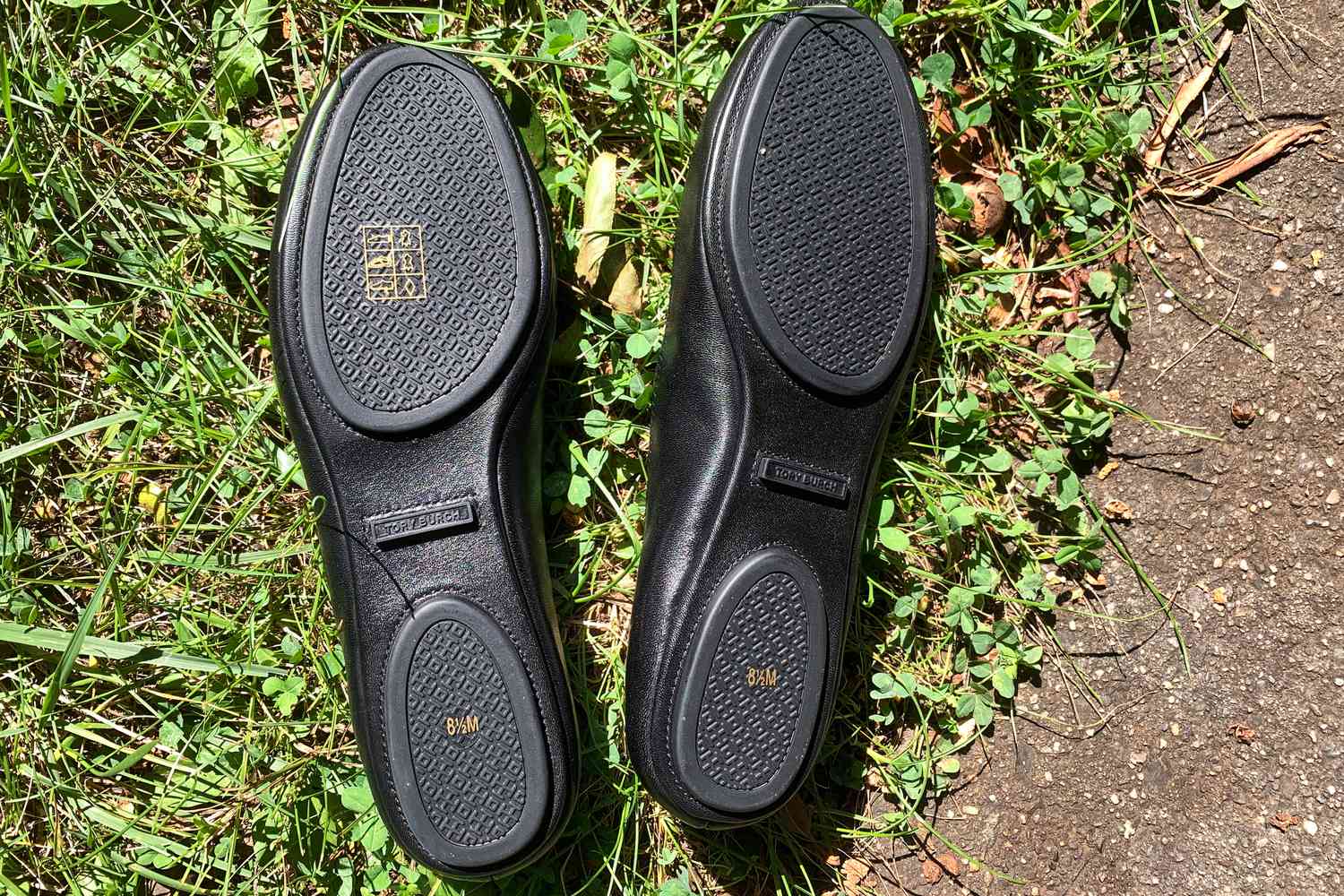 The bottom of a pair of Tory Burch Minnie Travel Ballet Flats