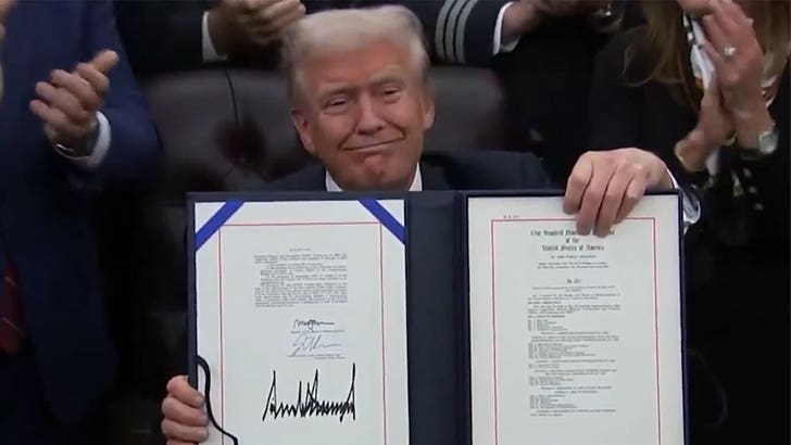 111325_donald_trump_signs_bill_kal