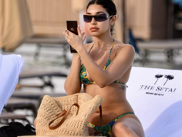 1202-Chantel-Jeffries-Stringy-Bikini-Lounging-Beach-Sub2