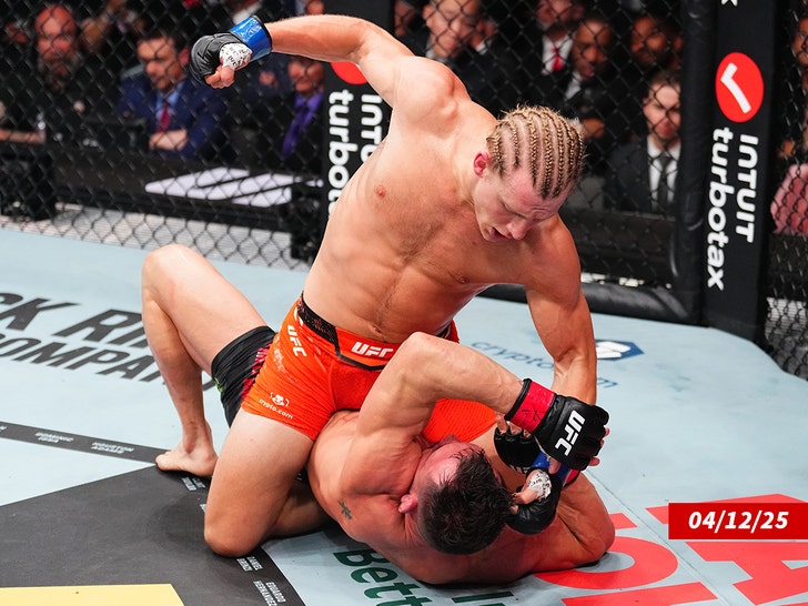 Paddy Pimblett of England punches Michael Chandler getty