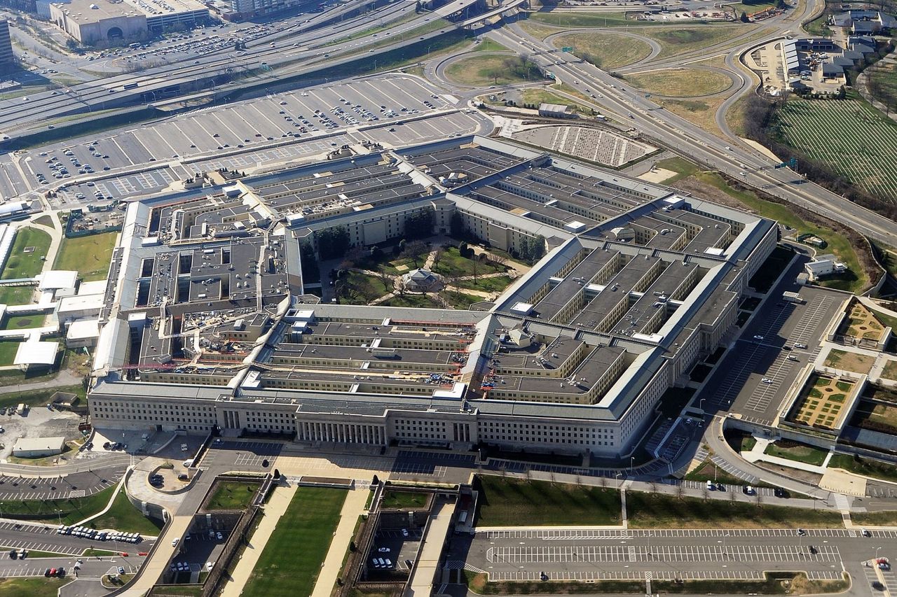 This picture taken 26 December 2011 shows the Pentagon building in Washington, DC. The Pentagon, which is the headquarters of the United States Department of Defense (DOD), is the world's largest office building by floor area, with about 6,500,000 sq ft (600,000 m2), of which 3,700,000 sq ft (340,000 m2) are used as offices. Approximately 23,000 military and civilian employees and about 3,000 non-defense support personnel work in the Pentagon. AFP PHOTO (Photo by STAFF / AFP) (Photo by STAFF/AFP via Getty Images) Overview of the U.S. Pentagon building in Washington, D.C. STAFF/AFP via Getty