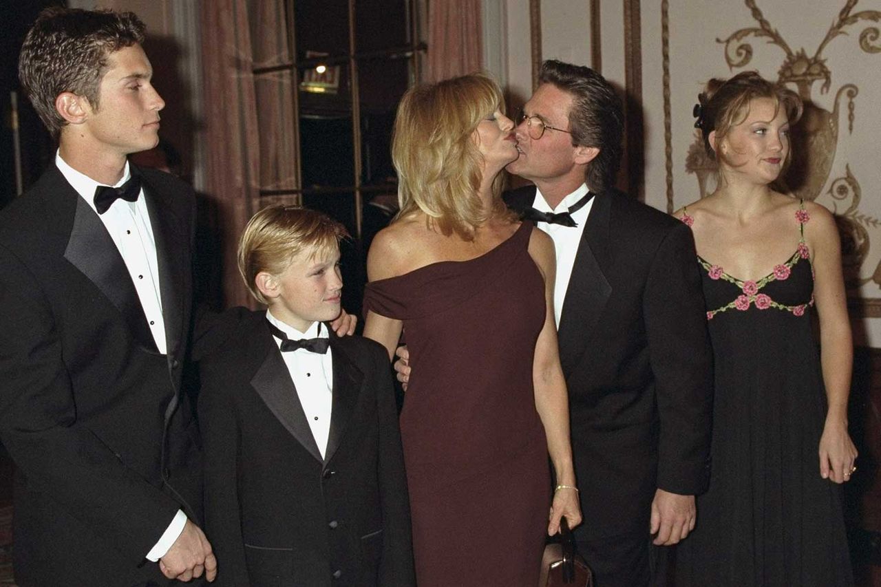 Goldie Hawn receiving a congratulatory kiss from Kurt Russell after the American Museum of the Moving Image saluted her at the Waldorf-Astoria. Hawn's children are (l. to r.) Oliver, Wyatt and Kate. Oliver Hudson, Wyatt Russell, Goldie Hawn, Kurt Russell and Kate HudsonCredit: Richard Corkery/NY Daily News Archive via Getty