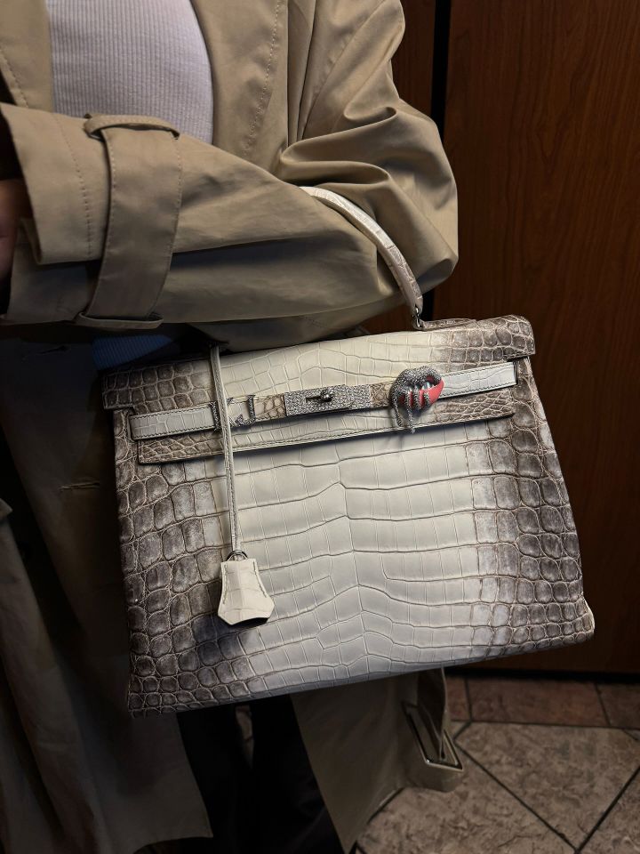 Kylie Jenner flaunts her new crystal-encrusted bag charm on her Birkin bag. Kylie Jenner/Instagram