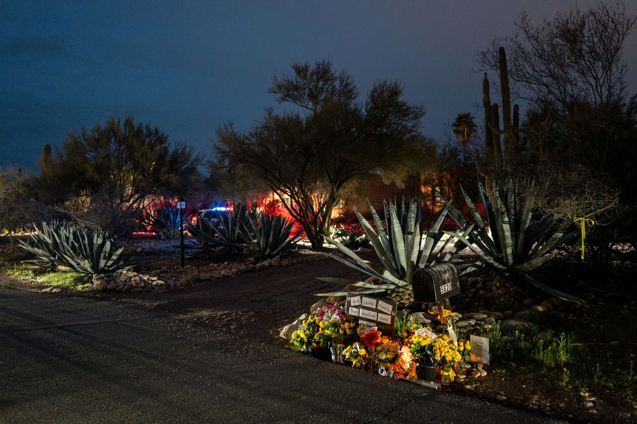 A makeshift memorial is seen at the entrance to Nancy Guthrie's residence in Tucson, Ariz., on Feb. 12, 2026 Brandon Bell/Getty