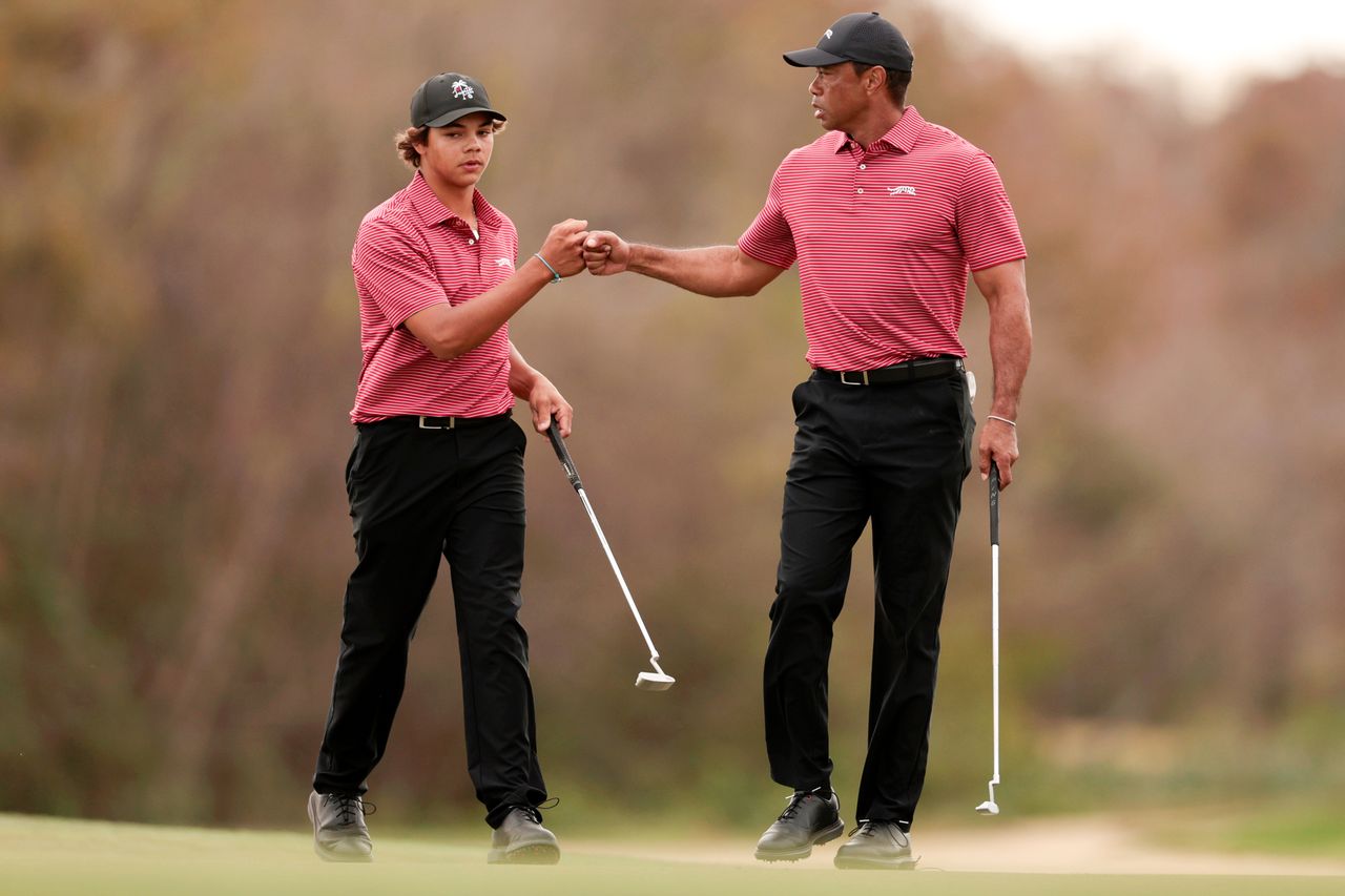 Charlie Woods and Tiger Woods, PNC Championship at Ritz-Carlton Golf Club in Dec. 2024 in Florida Douglas P. DeFelice/Getty