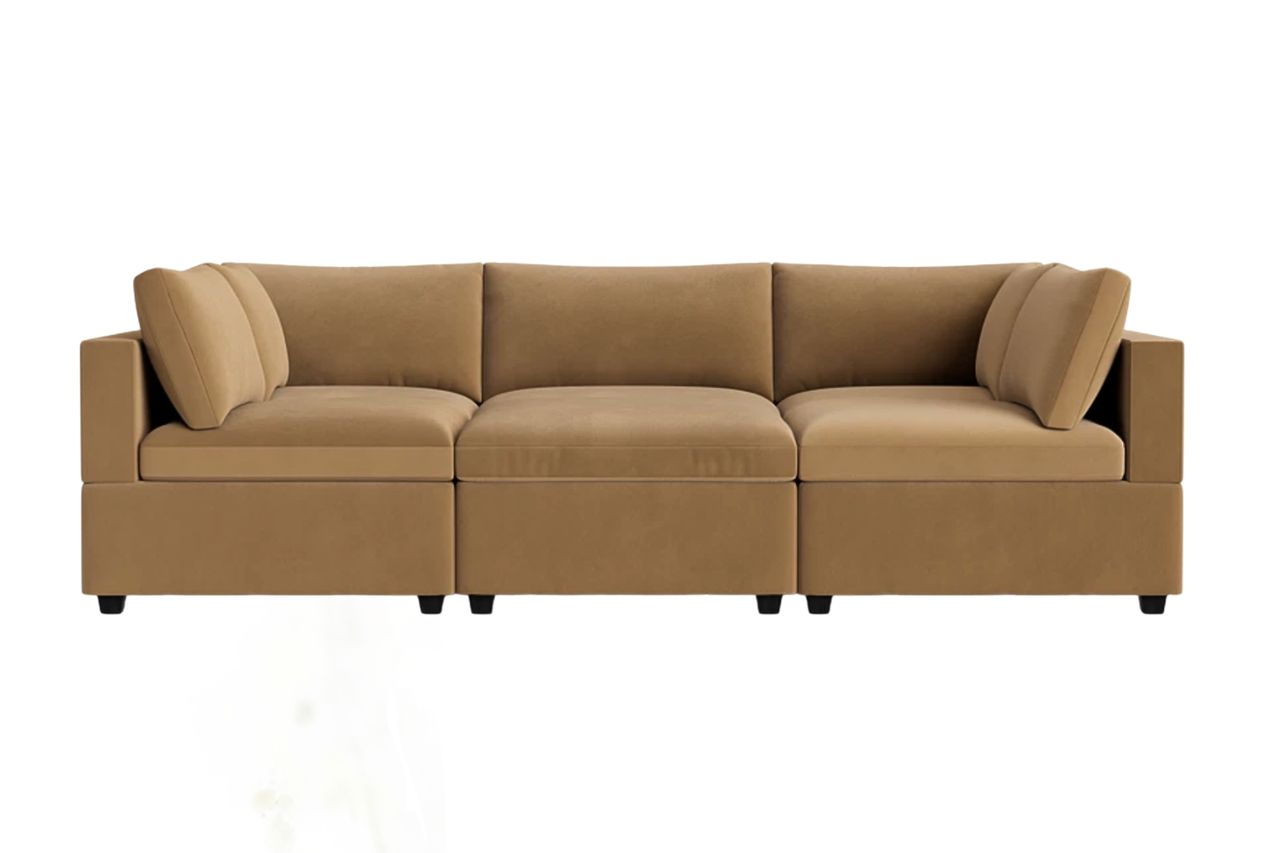 A modular sectional sofa consisting of three seats with loose cushions and an armless design Albany Park