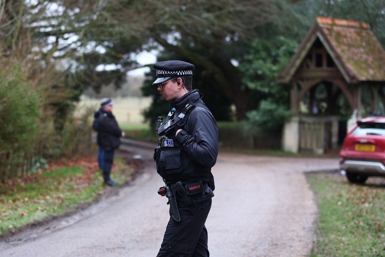 Police officers stand guard near the entrance to Wood Farm, the home of Andrew Mountbatten-Windsor on February 19, 2026 in Sandringham, Norfolk. Andrew Mountbatten-Windsor has been arrested on suspicion of misconduct in public office, following police investigation into the recently release Epstein files. The former prince continues to deny any wrongdoing. Police at Sandringham on Feb. 19, 2026, where ex-Prince Andrew was arrested Peter Nicholls/Getty