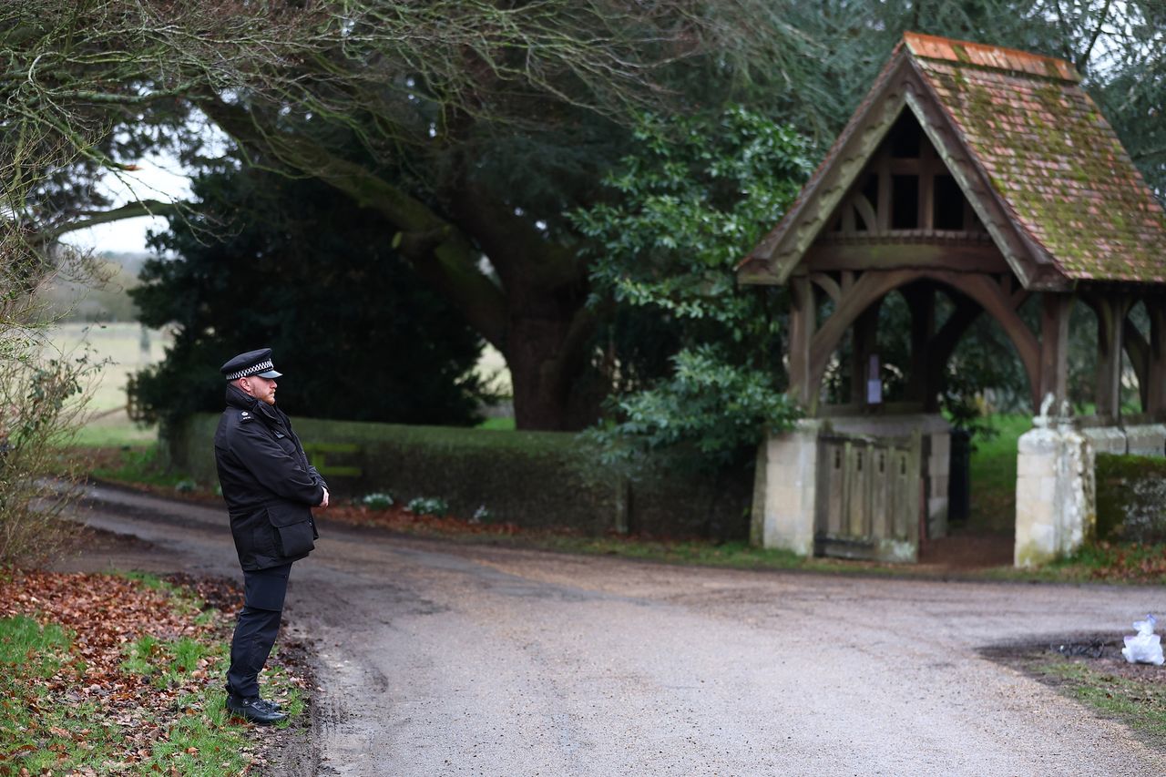 A police officer stands guard near the entrance to Wood Farm, the home of Andrew Mountbatten-Windsor on February 19, 2026 in Sandringham, Norfolk. Andrew Mountbatten-Windsor has been arrested on suspicion of misconduct in public office, following police investigation into the recently release Epstein files. The former prince continues to deny any wrongdoing. Police activity at Sandringham on Feb. 19, 2026, where ex-Prince Andrew was arrested Peter Nicholls/Getty