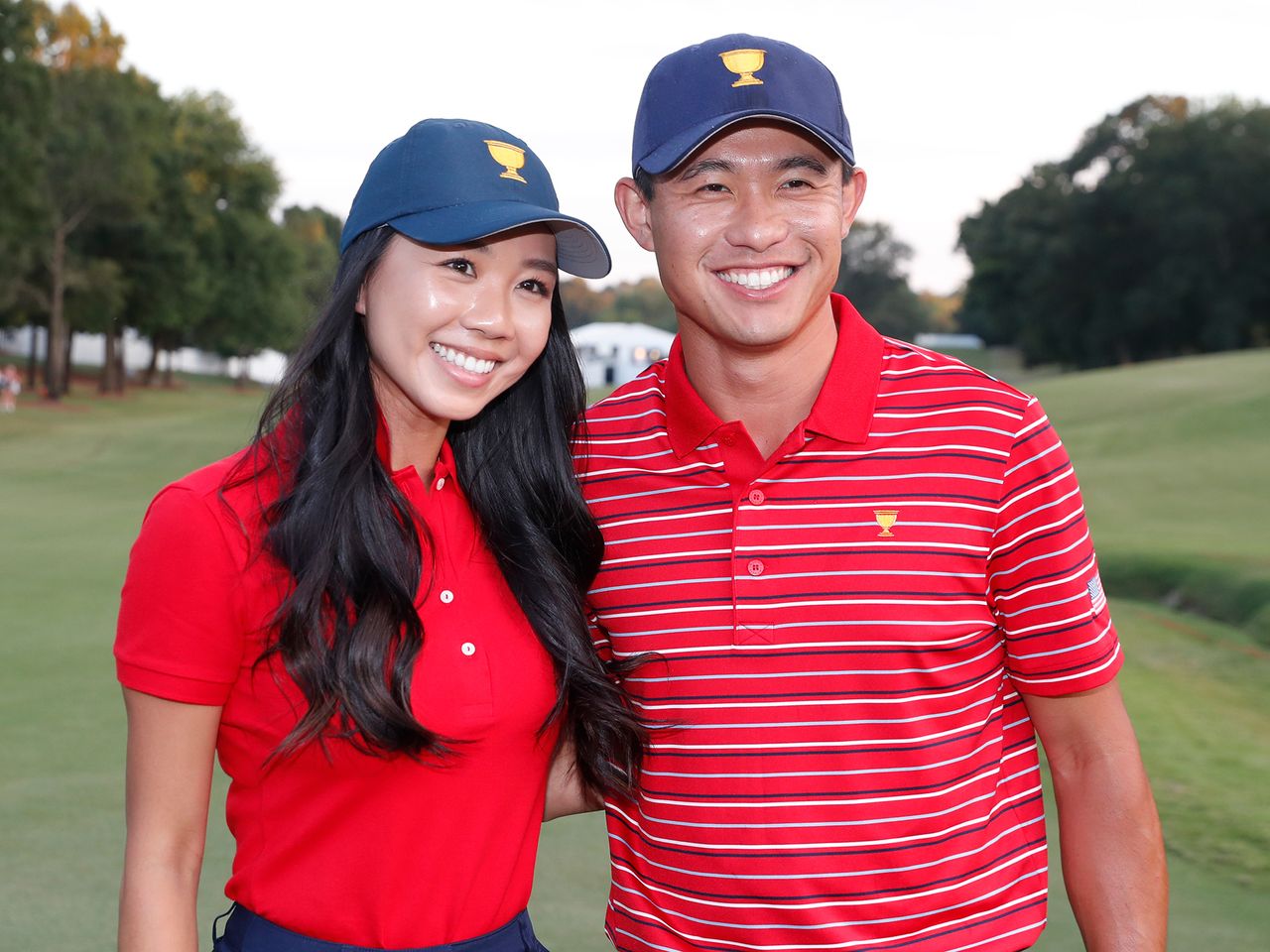 Collin Morikawa poses for a photo with his girlfriend Katherine Zhu after Team USA won the 2022 Presidents Cup on September 25, 2022 at Quail Hollow Club in Charlotte, North Carolina Katherine Zhu (left) and Collin Morikawa in 2022 Brian Spurlock/Icon Sportswire/Getty