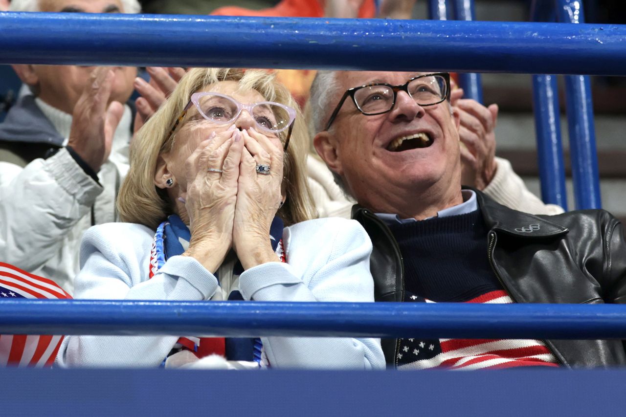 Parents of United States pairs skater Evan Bates watch their son skate at the 2026 Winter Olympic games on February 06, 2026 in Milan, Italy. Robert Gauthier / Los Angeles Times via Getty