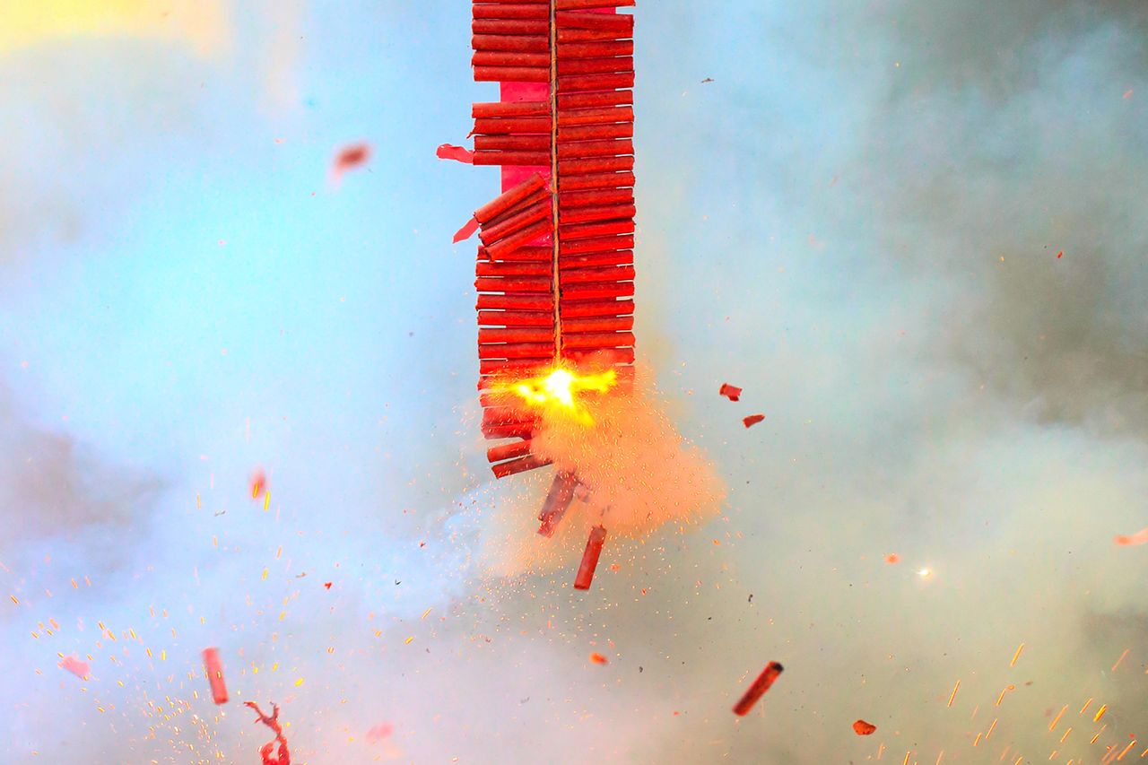 STOCK - Firecracker in action, Chinese style STOCK - Firecracker in action for Lunar New Year Getty