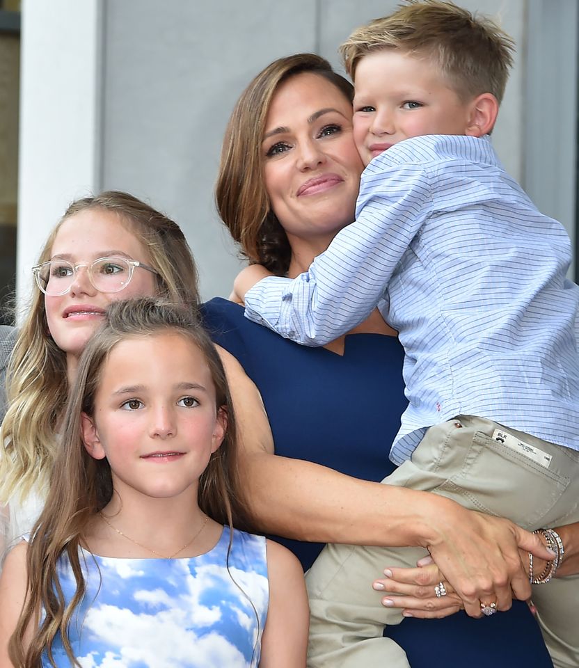 Jennifer Garner poses with her children Violet Affleck, Seraphina Rose Elizabeth Affleck and Samuel Garner Affleck at her star on the Hollywood Walk of Fame, August 20, 2018 in Hollywood, California Jennifer Garner with her kids. ROBYN BECK/AFP