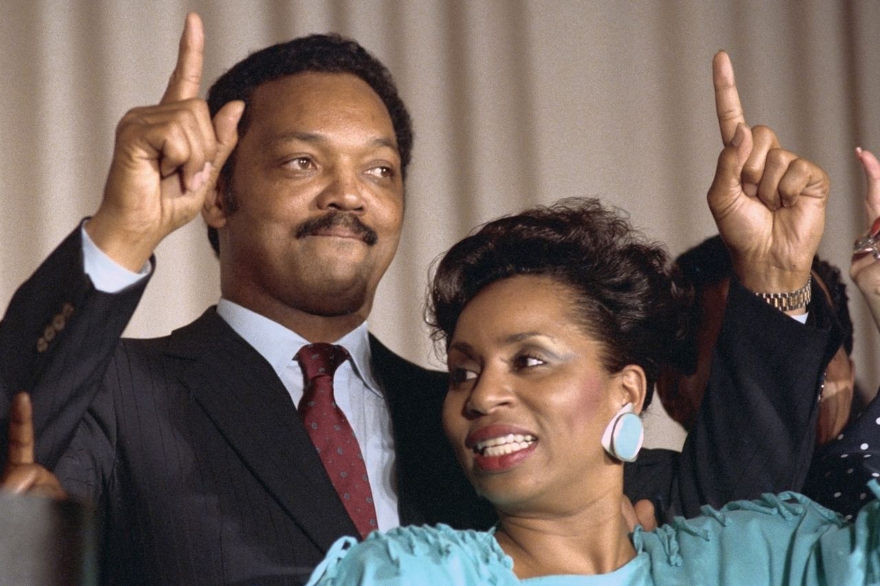 Democratic presidential candidate Jesse Jackson and his wife Jackie celebrate his victory in the District of Columbia primary. Jesse Jackson and his wife Jackie Bettmann/Getty