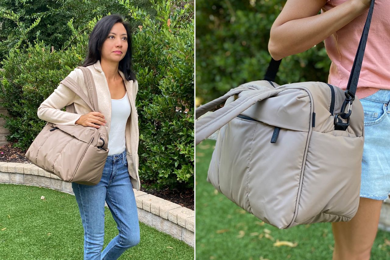 A person carrying a large quilted handbag outdoors with a closeup view of the handbag People