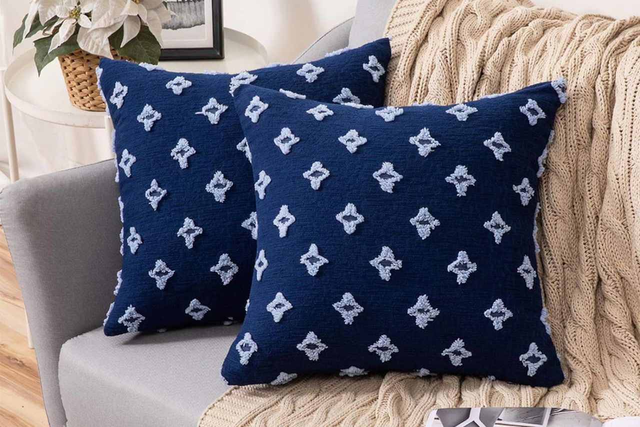 Set of Two 2 Sizes White Embroidered Diamond Throw Pillow Covers Credit: Wayfair