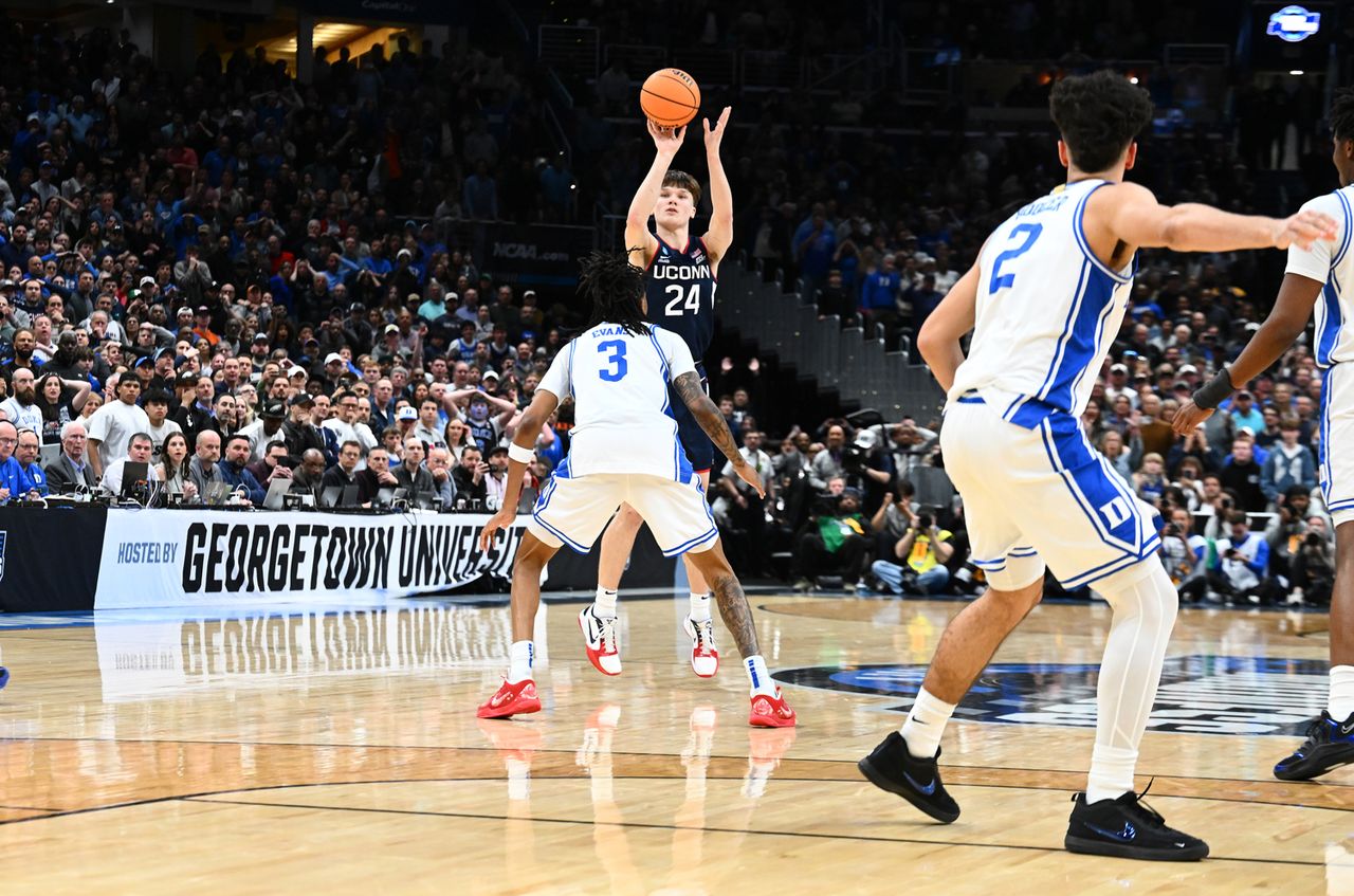 Braylon Mullins #24 of the UConn Huskies shoots the game winner over Duke in the Elite Eight of the 2026 NCAA Men's March Madness Tournament.Credit: Brett Wilhelm/NCAA Photos via Getty