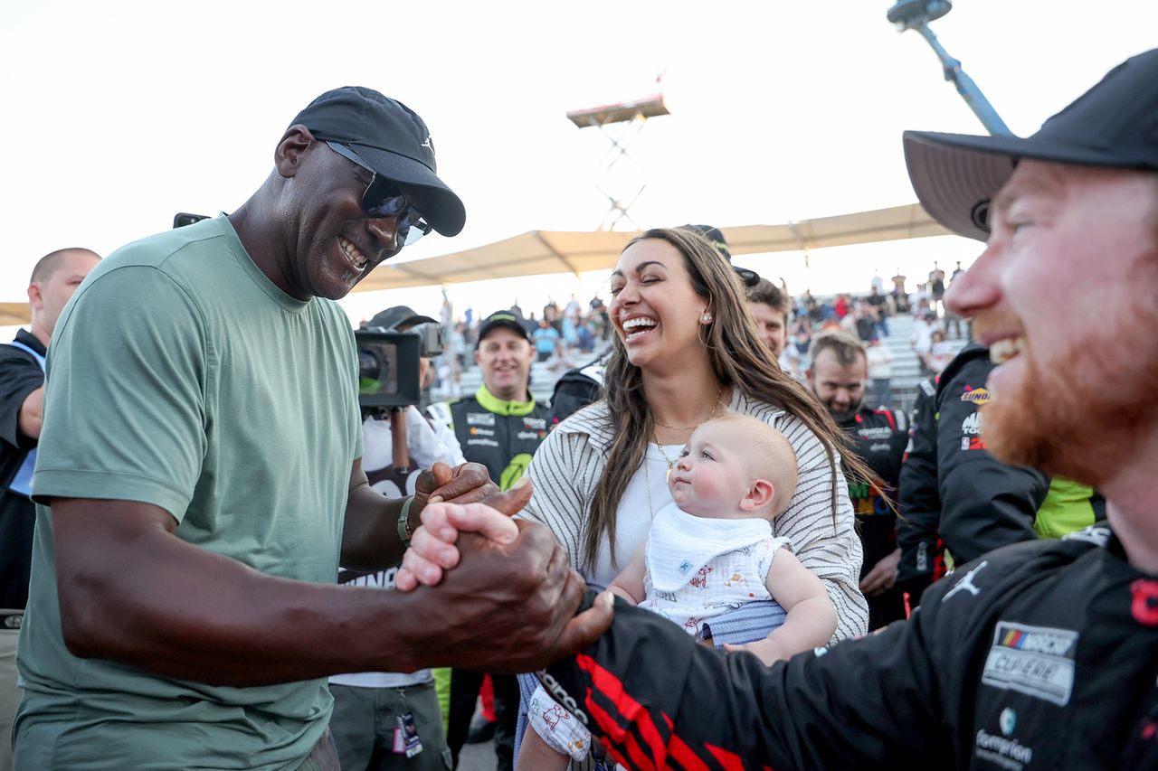 Michael Jordan celebrates with Tyler Reddick at the NASCAR Cup Series DuraMax Grand PrixCredit: James Gilbert/Getty