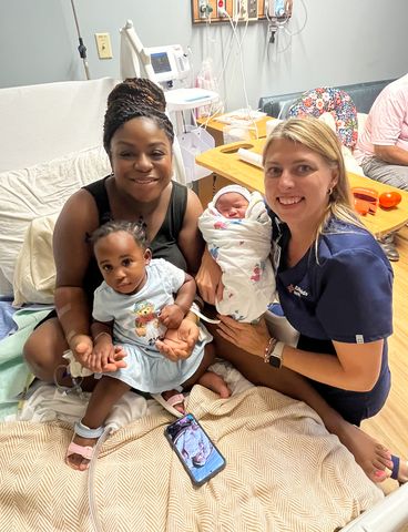 Patricia Bery, Laurie Van Damme and Bery's familyCredit: HCA Florida Brandon Hospital