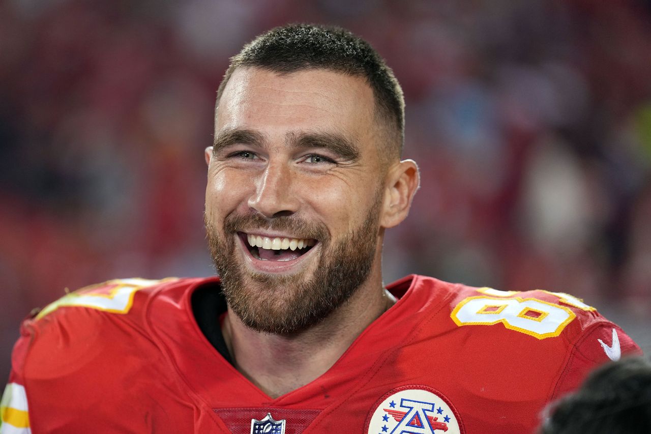 Travis Kelce smiles after game at Arrowhead Stadium on October 10, 2022Credit: Jason Hanna/Getty