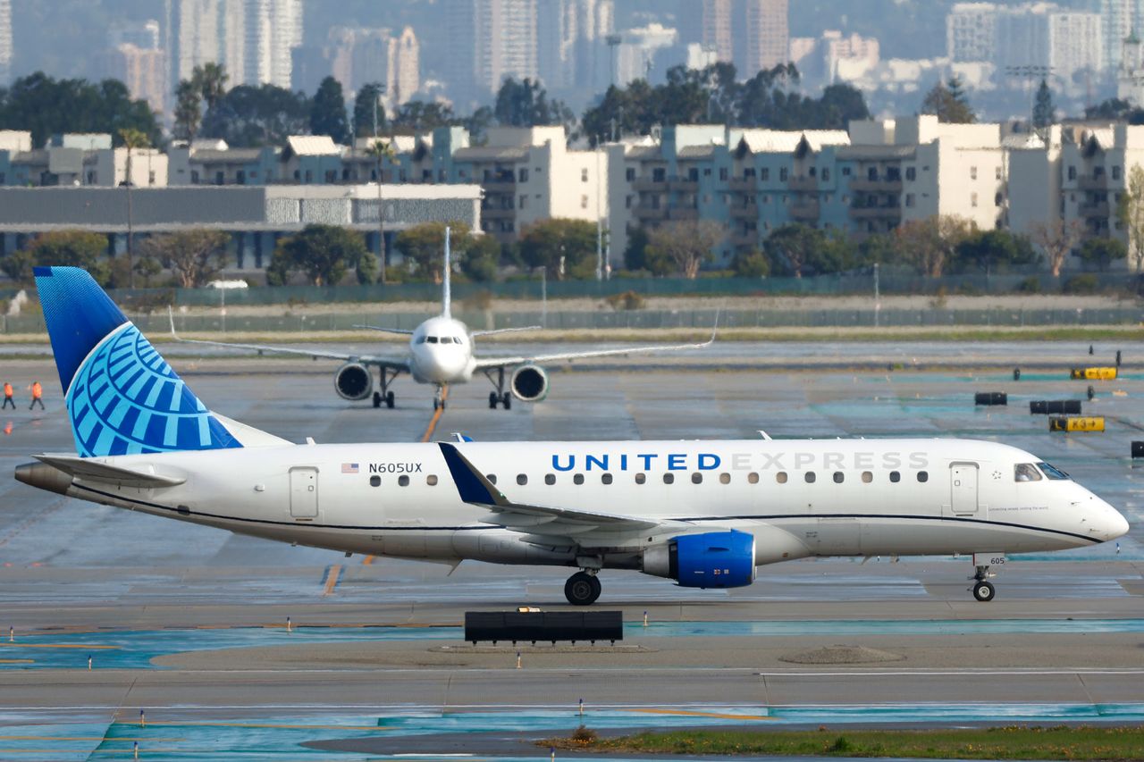 An United Express, operated by SkyWest Airlines aircraft taxis A United Express flight operated by SkyWest AirlinesCredit: Kevin Carter/Getty