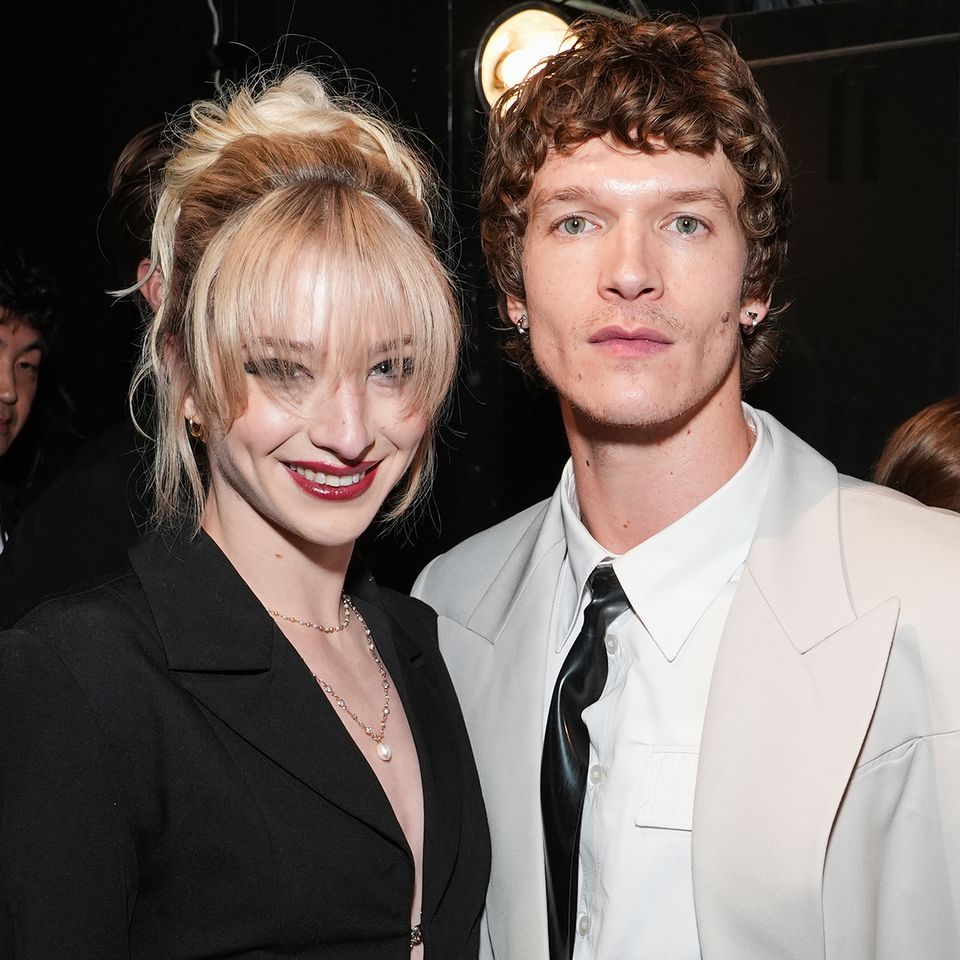 Amber Glenn and Connor StorrieCredit: Presley Ann/Getty