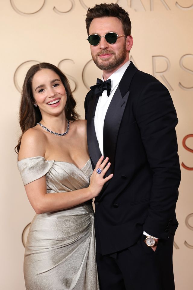 Alba Baptista and Chris Evans attend the 98th Oscars at Dolby Theatre on March 15, 2026 in Hollywood, California. Alba Baptista and Chris Evans look loved-up at their first Oscars togetherCredit: Mike Coppola/Getty
