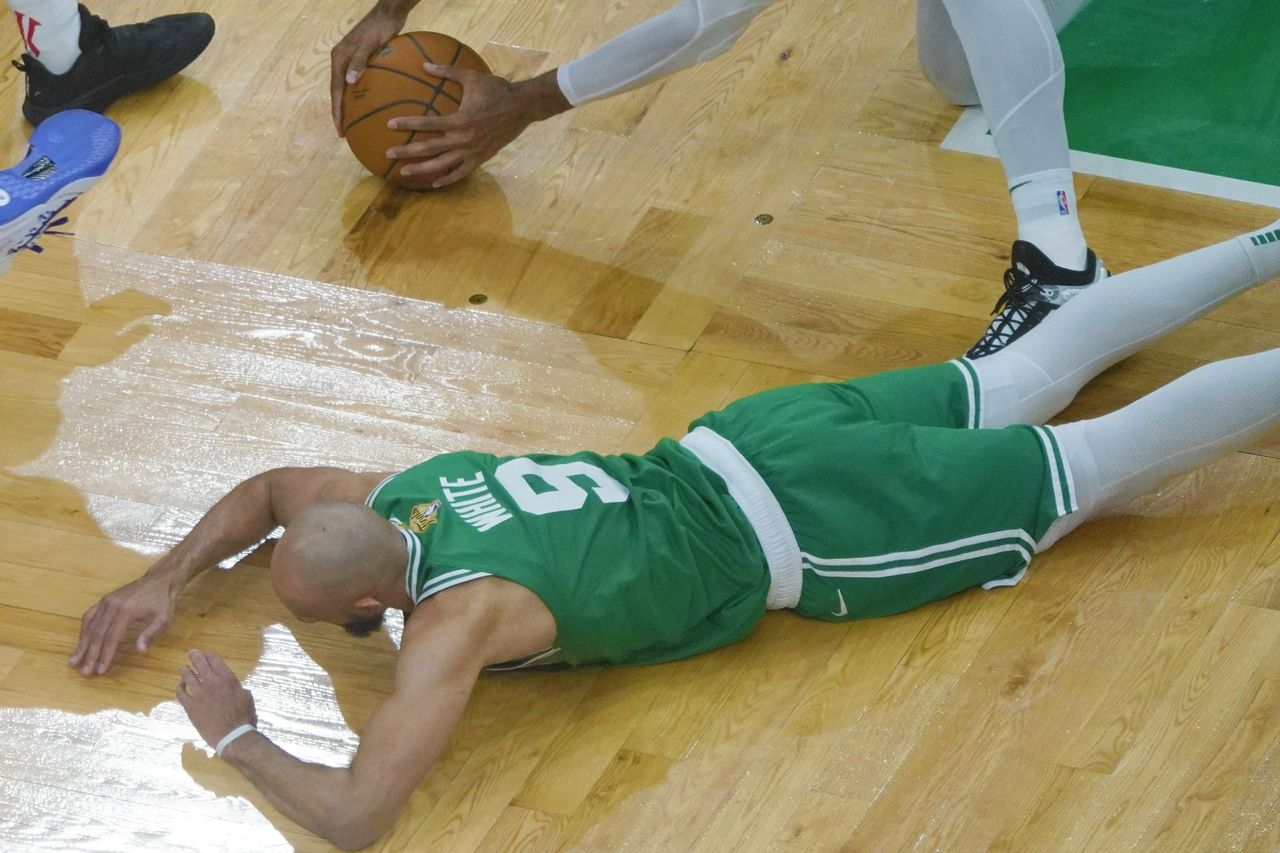 Derrick White on the floor during the Boston Celtics game against the Dallas Mavericks during Game 5 of the 2025 NBA Finals.Credit: Wu Xiaoling/Xinhua via Getty