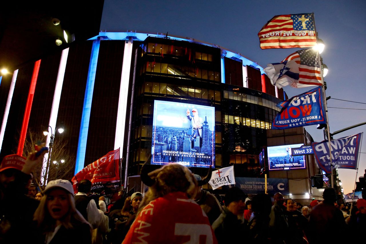 Donald Trump supporters wait outside Madison Square Garden.Credit: LEONARDO MUNOZ/AFP via Getty