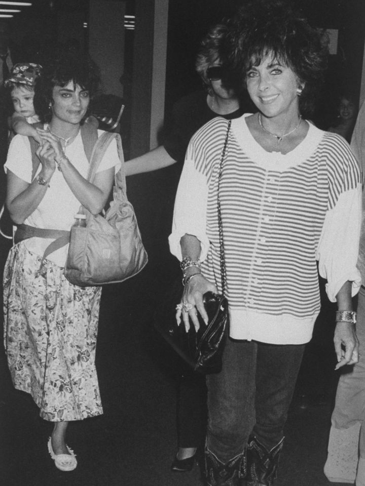 Elizabeth Taylor (right) with daughter Liza Todd Tivey and grandson Quinn at LAX in L.A. on Aug. 16, 1987Credit: DMI/The LIFE Picture Collection/Shutterstock