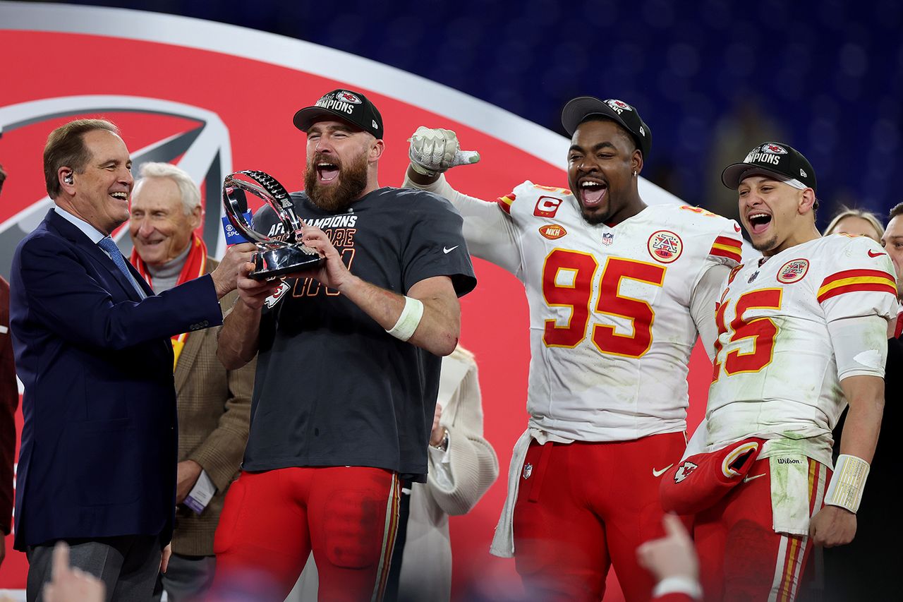 Jim Nantz alongside Travis Kelce.Credit: Rob Carr/Getty