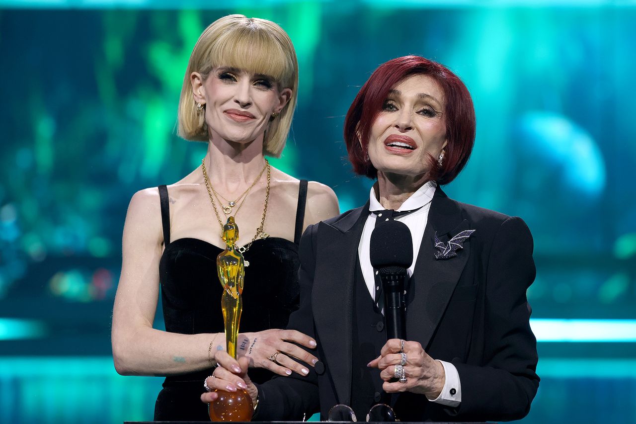 MANCHESTER, ENGLAND - FEBRUARY 28: (EDITORIAL USE ONLY) Kelly Osbourne and Sharon Osbourne accept the 'Lifetime Achievement' award on behalf of the late Ozzy Osbourne on stage during The BRIT Awards 2026 at Co-op Live on February 28, 2026 in Manchester, England. Kelly Osbourne and Sharon OsbourneCredit: JMEnternational/Getty