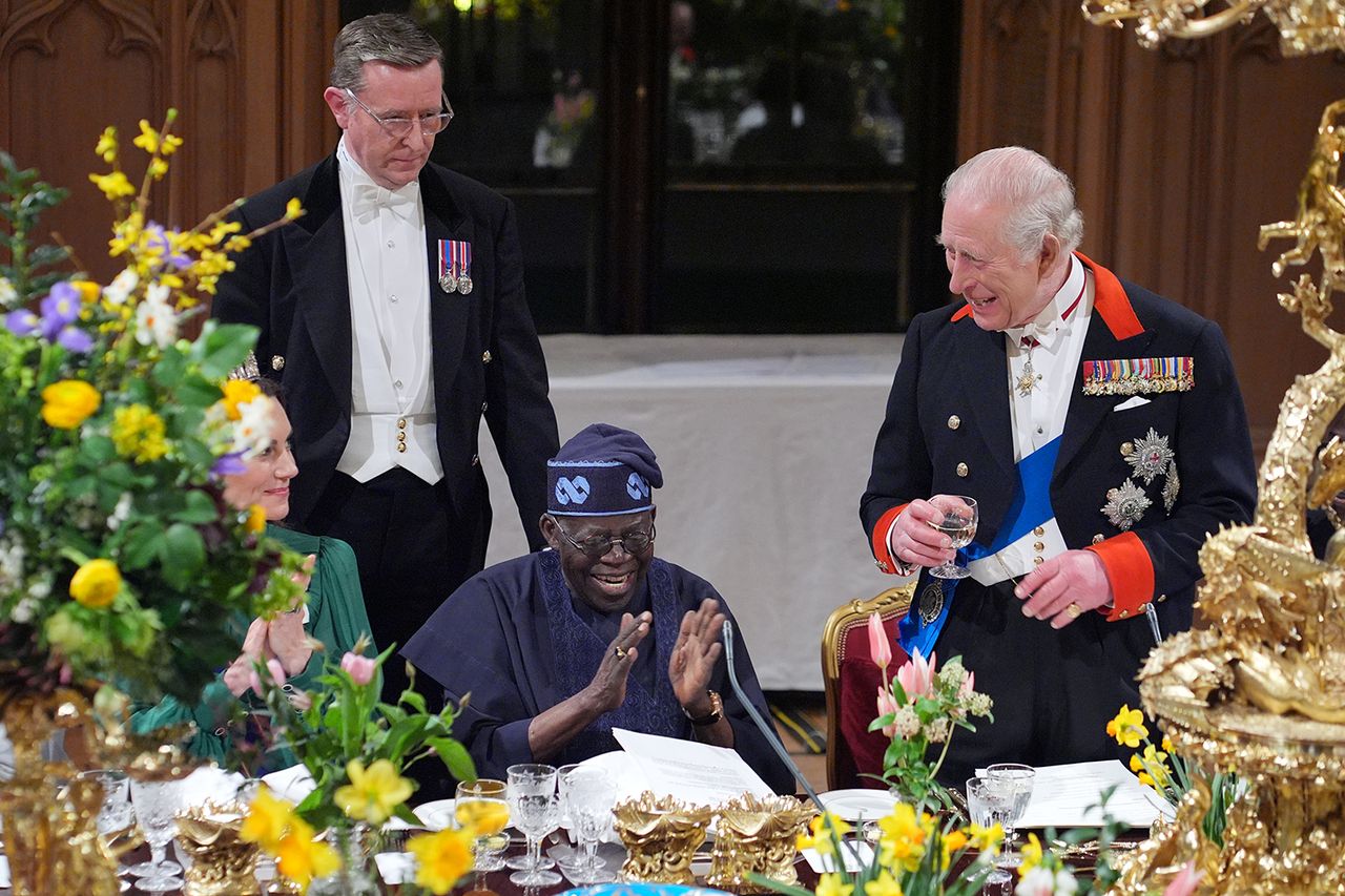King Charles III delivers his speech as President of Nigeria Bola Ahmed Tinubu (C) and Catherine, Princess of Wales (L) listen during a State Banquet in St George's Hall on day one of their state visit to the UK at Windsor Castle on March 18, 2026 in Berkshire, England. King Charles delivering his speech at the state banquetCredit: Yui Mok - WPA Pool/Getty