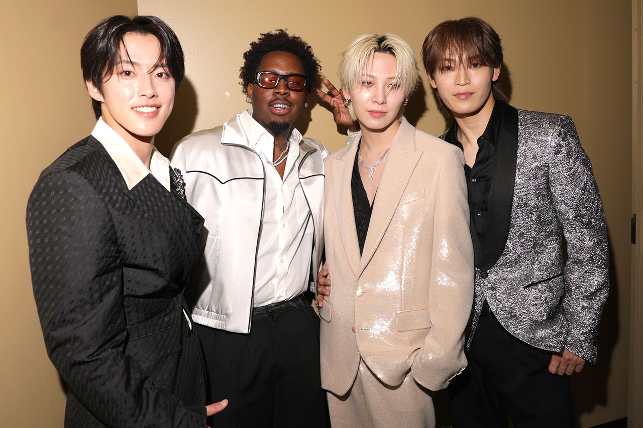 Kono Junki, Kawashiri Ren and Yonashiro Sho of JO1 and Real Boston RicheyCredit: Matt Winkelmeyer/Getty