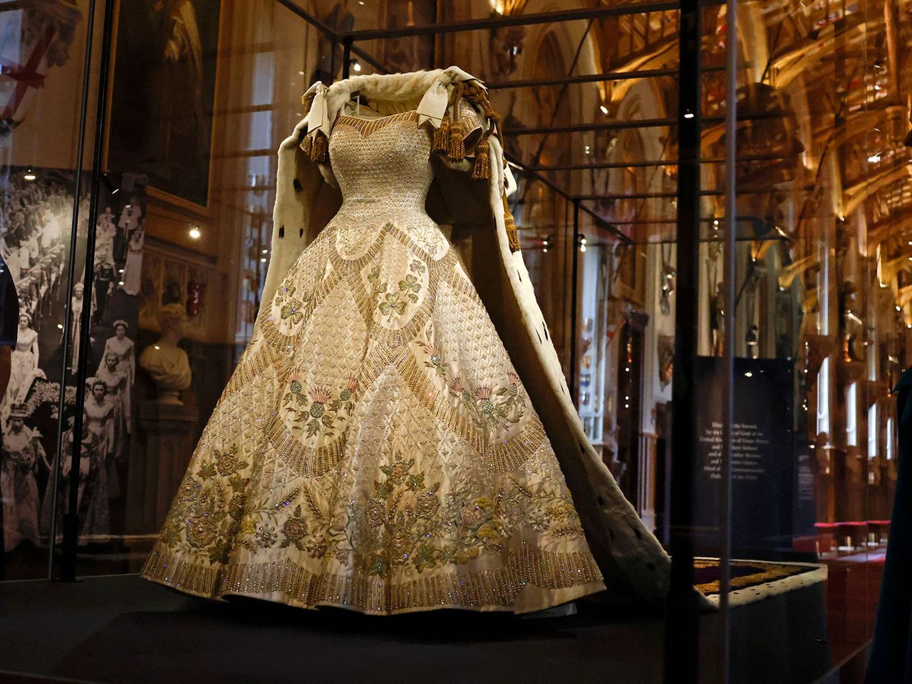 The Coronation Dress and Robe of Estate, worn by Britain's Queen Elizabeth on her 1953 coronation. The Coronation Dress and Robe of Estate, worn by Britain's Queen Elizabeth on her 1953 coronation.Credit: CARLOS JASSO/AFP