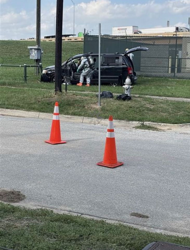 Authorities in hazmat suits investigate van in Fort Worth, TexasCredit: Fort Worth Police Department/Facebook