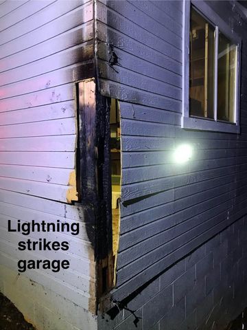 Damage to Karen Boudreau's garage after a lightning strike on Saturday night.Credit: Peardale Chicago Park Fire