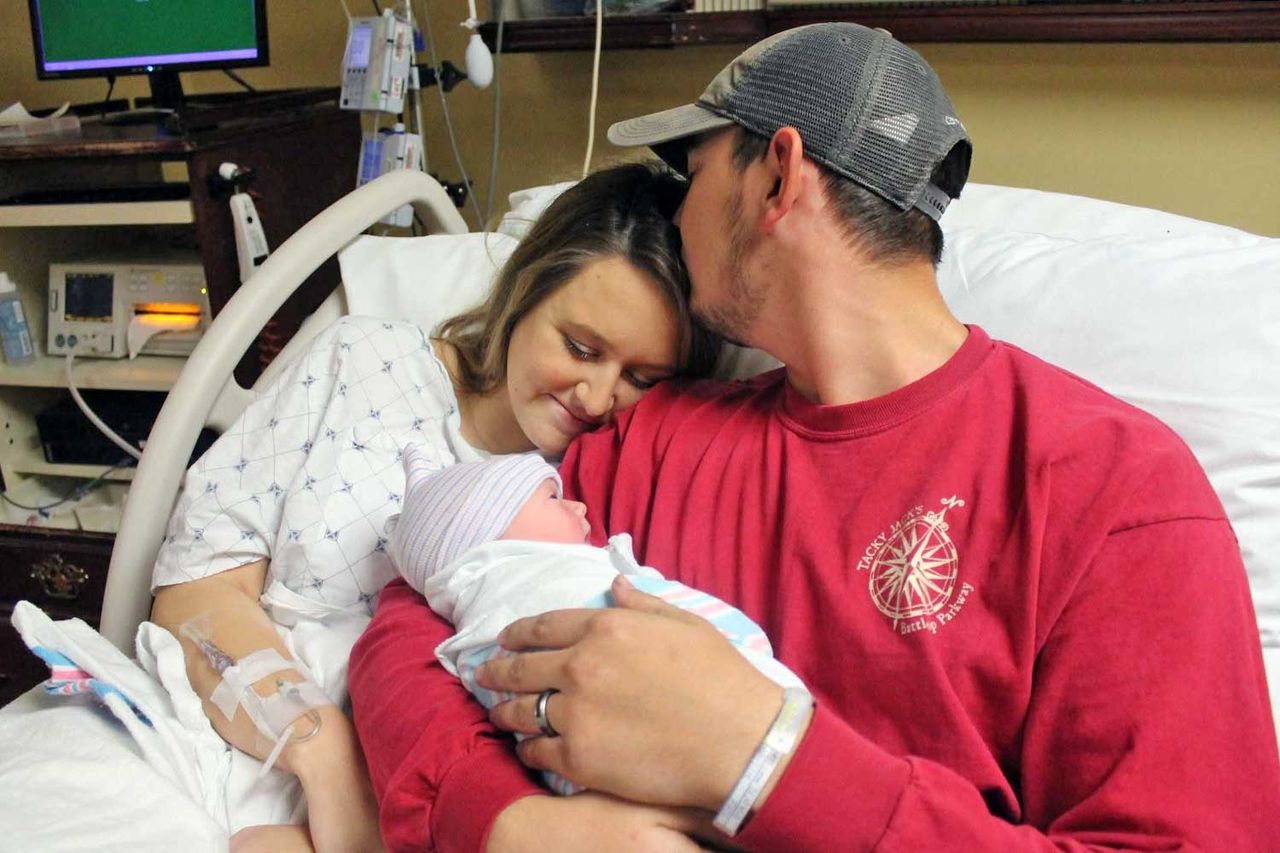 Kayla and Austin Stewart and their baby.Credit: Kayla Stewart