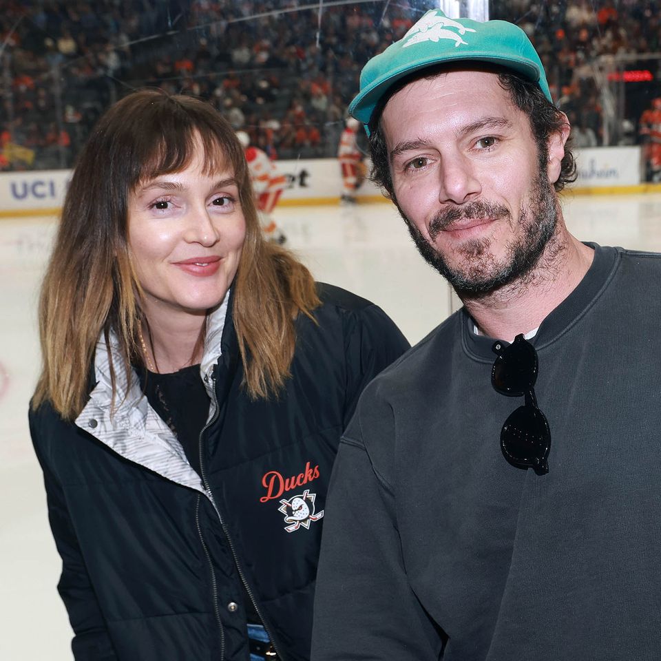 Leighton Meester and Adam Brody attend the game between the Anaheim Ducks and Calgary Flames at Honda Center on April 04, 2026 in Anaheim, California. Leighton Meester and Adam BrodyCredit: Nicole Vasquez /NHLI via Getty
