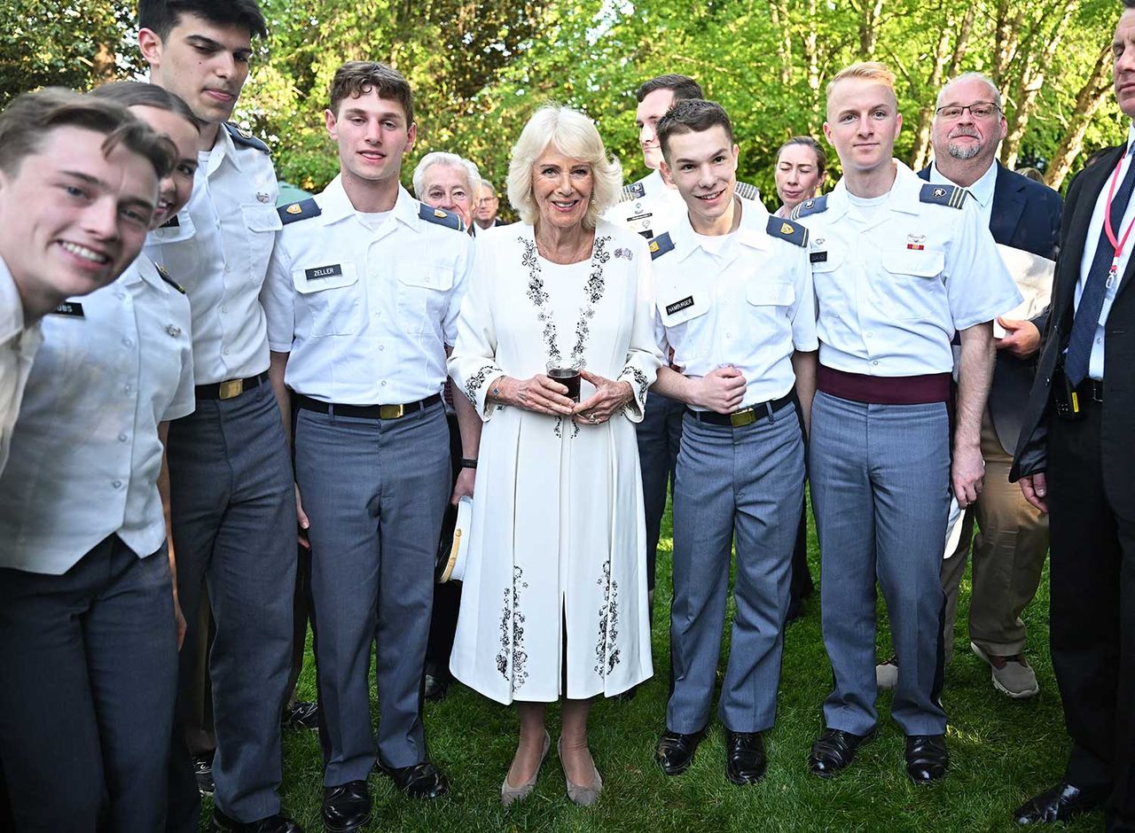 Queen Camila poses with US military recruits during a garden party in Washington, D.C. on April 27, 2026.Credit: Samir HUSSEIN / POOL / AFP via Getty