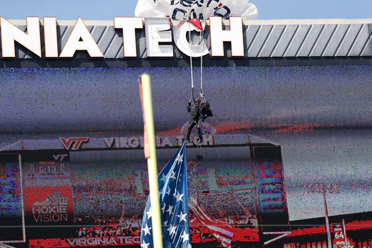 A parachuter crashes into scoreboard at Virginia Tech's Lane Stadium on April 18, 2026Credit: Lee Coleman/Icon Sportswire via Getty